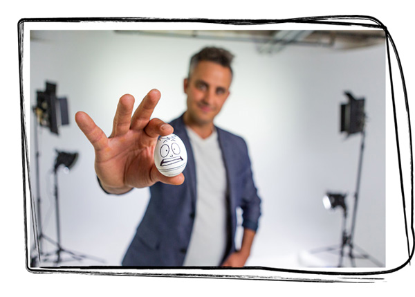 Paul Angone holding-an-egg-with-box